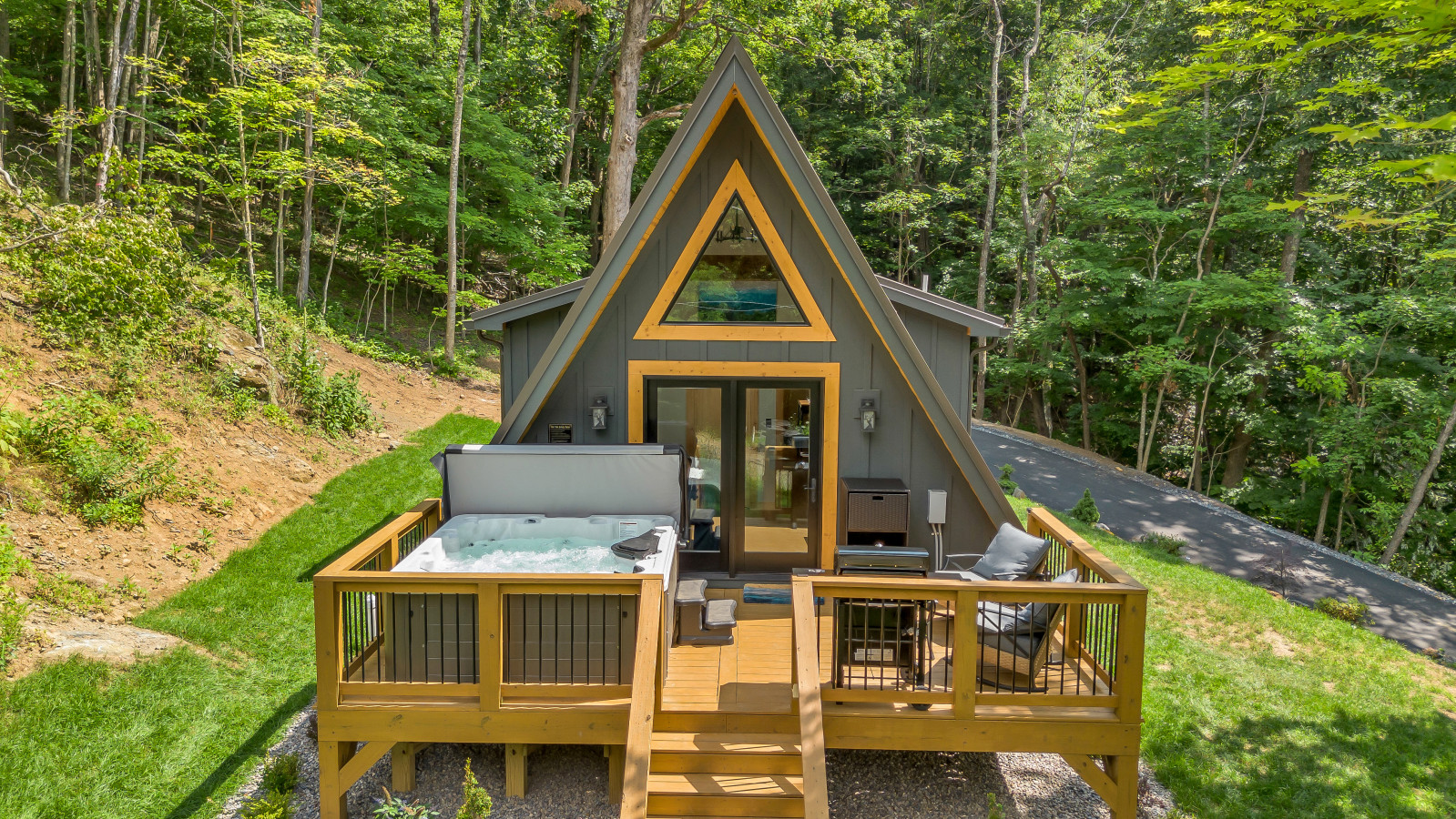 Elevated view of High Peak with hot tub and mountain woods